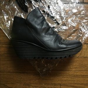 Fly London Black leather Yip ankle boot.